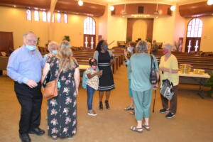 Family mingling after service - Beattie Road church of Christ